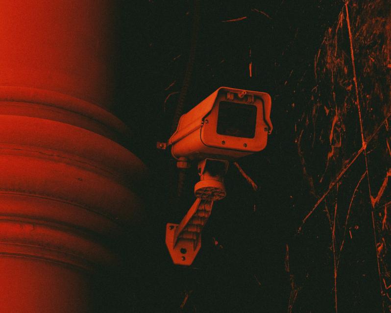 surveillance camera in a red light